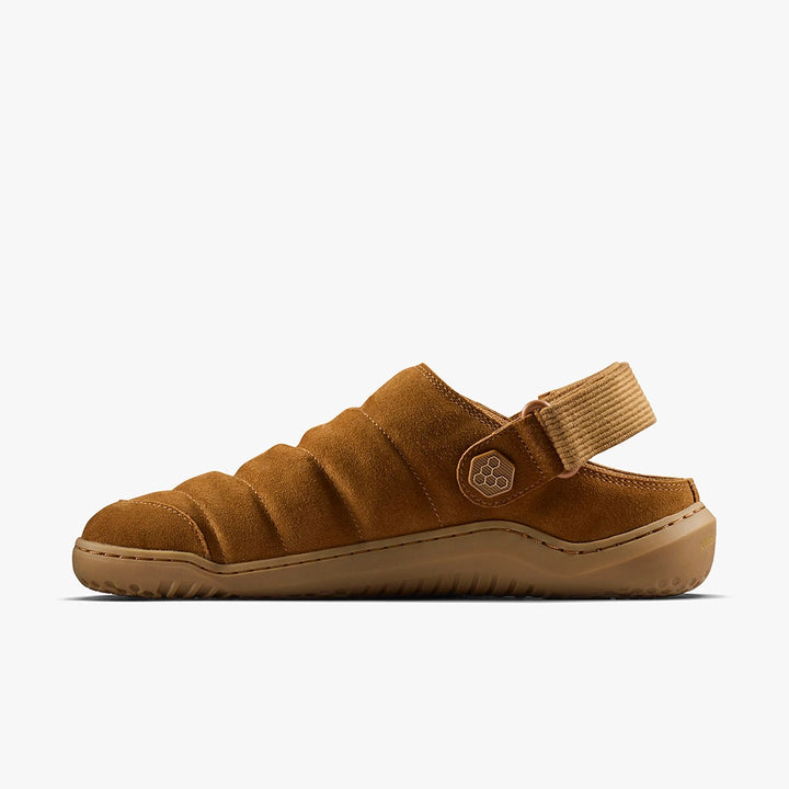 The Gobi Wavey Mule (Men's) is a brown quilted leather sandal with a padded upper, textured rubber sole, and adjustable back strap, shown against a plain white background.