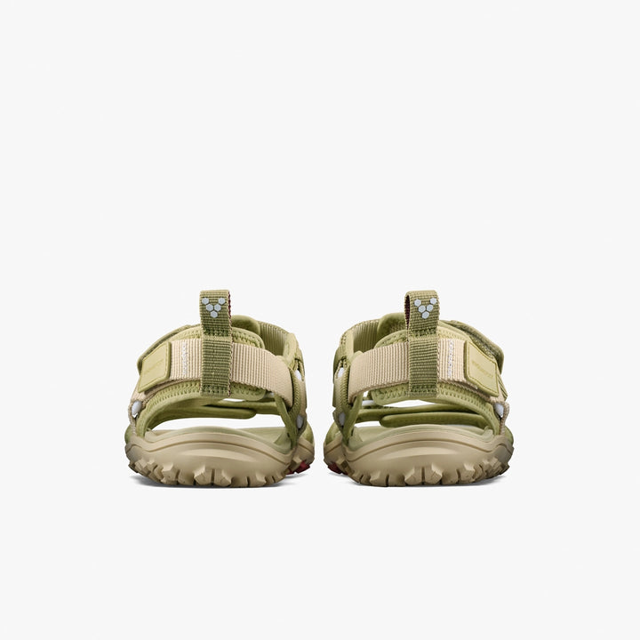 The VIVOBAREFOOT Tracker Ora Sandal (Men's) in green and beige, shown from the back with rugged soles and adjustable straps, displayed against a plain white background.