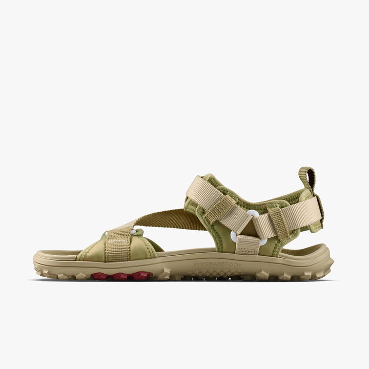 The VIVOBAREFOOT Tracker Ora Sandal (Women's) features a tan and olive green neoprene upper, adjustable straps, a rugged treaded sole, and a heel loop, shown against a plain white background.