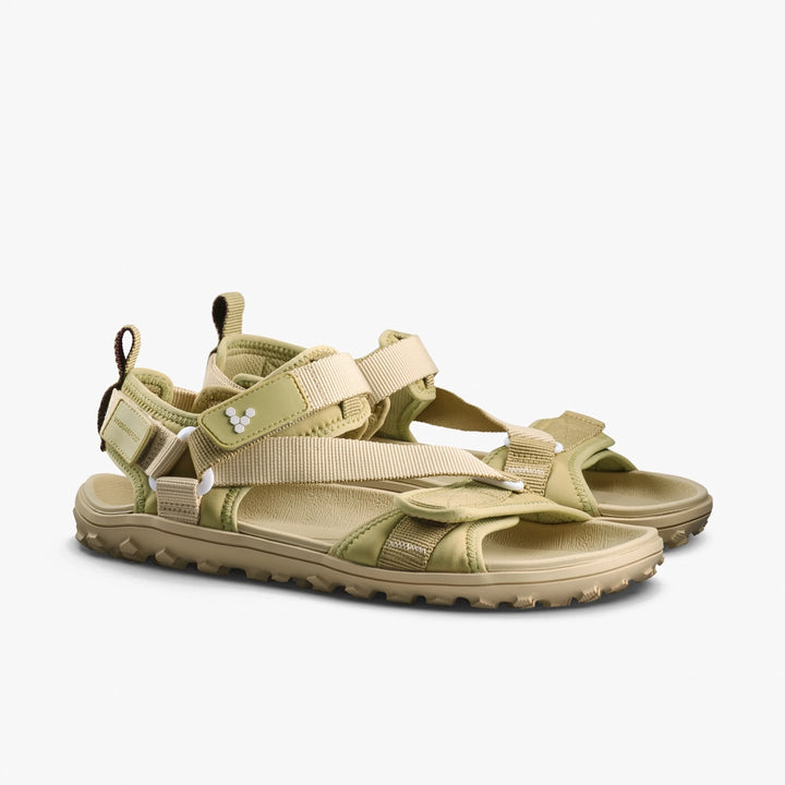 The VIVOBAREFOOT Tracker Ora Sandal (Men's) features beige and olive green neoprene uppers, thick adjustable straps, rugged soles, and open toes—ideal for hiking or outdoor activities—shown against a plain white background.