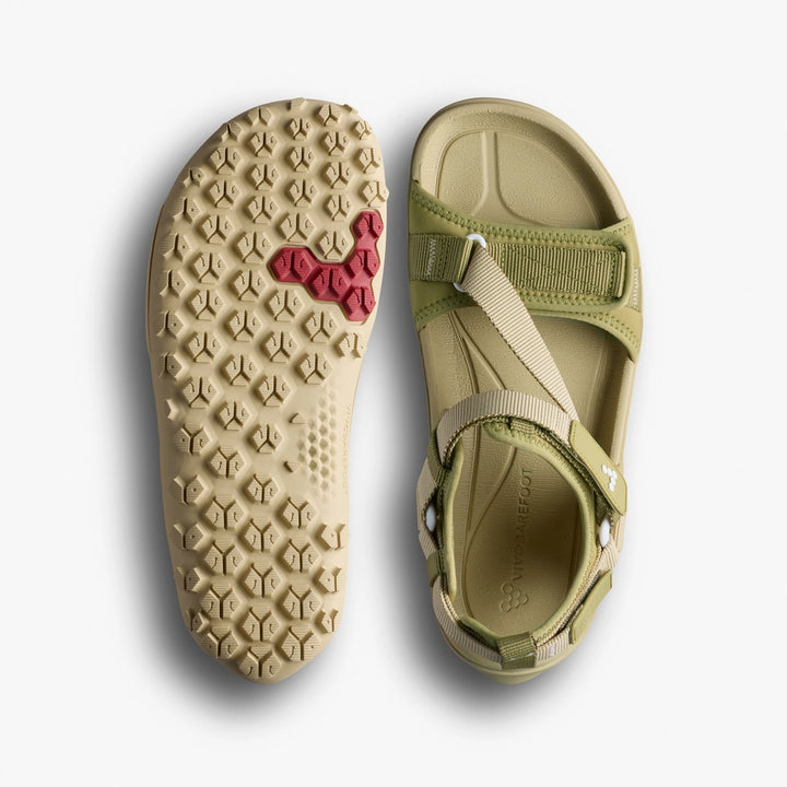 The VIVOBAREFOOT Tracker Ora Sandal (Women's) in light green and beige features adjustable neoprene upper straps and all-terrain textured soles, including a red hexagonal pattern, shown from above and below.