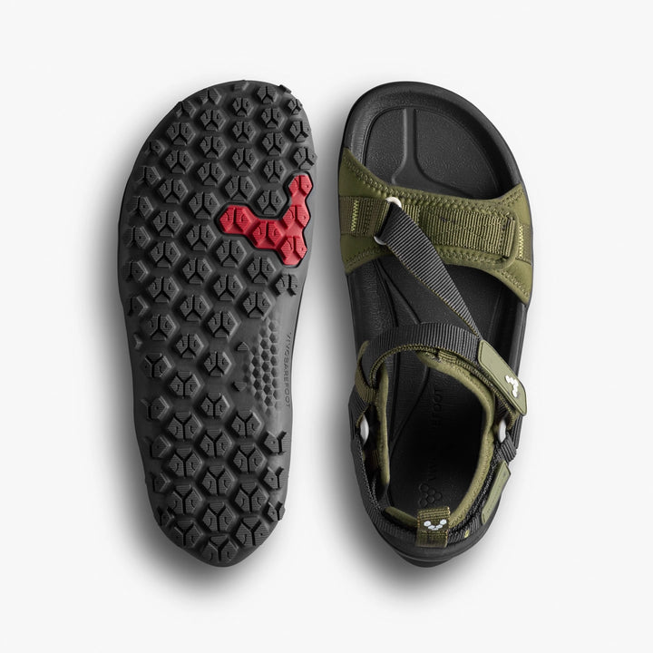 The VIVOBAREFOOT Tracker Ora Sandal (Men's) in olive green and black features a grippy, textured sole with red accents for stability, plus adjustable straps and buckles to secure your foot for any adventure.