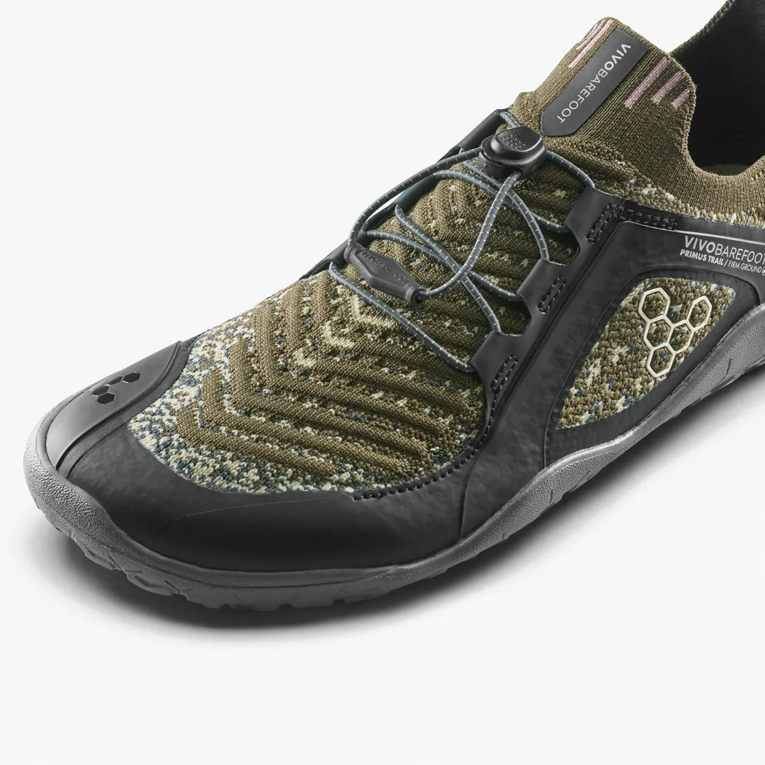 A green and black Vivobarefoot Primus Trail Knit FG Grounding (Women’s) barefoot trail shoe with a toggle lace system.