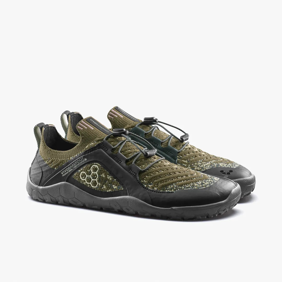 A pair of olive green Vivobarefoot Primus Trail Knit FG Grounding (Men’s) barefoot trail shoes with black trim and toggle lacing.