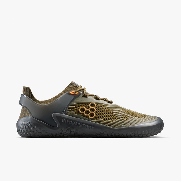 Side view of the VIVOBAREFOOT Motus Strength II (Men's) in olive green and gray, featuring a textured sole and honeycomb side pattern—ideal for high-impact workouts or CrossFit.