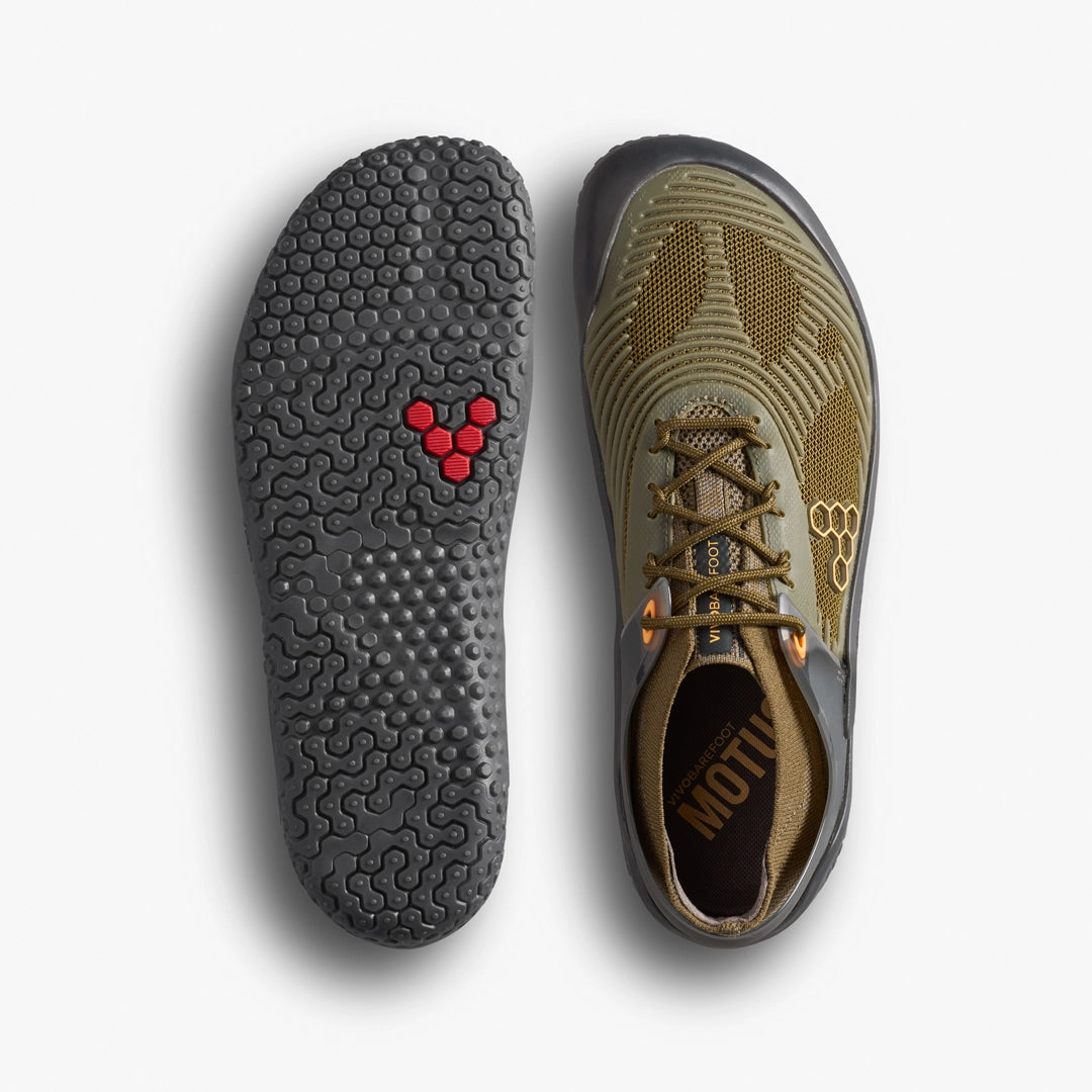 The VIVOBAREFOOT Motus Strength II (Men's) barefoot trainers are olive green with a mesh upper, black accents, and a textured hexagonal sole featuring a red logo. Shown from both top and bottom views.