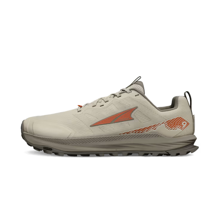 The ALTRA Lone Peak 9 Wide (Men's) is a beige zero drop trail running shoe with an orange logo and side design, gray rugged sole, and heel pull tab, shown from the side on a white background.