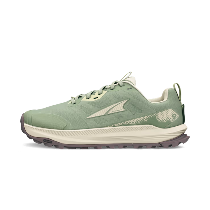 The ALTRA Lone Peak 9 Wide (Women's) is a light green trail running shoe with cream accents, a cushioned sole, rugged brown outsole, geometric heel design, side logo, and roomy toe box for comfort on tough terrain.