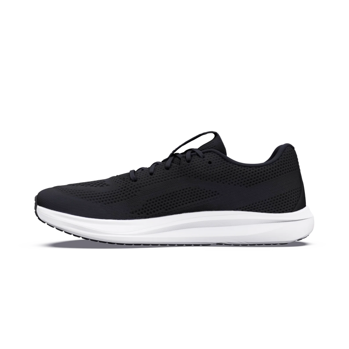 A black ALTRA Escalante 5 men’s sneaker with a white sole is displayed in side profile against a plain light background. Designed with black laces, a breathable mesh upper, and ALTRA’s signature FootShape Fit, this shoe enhances comfort and supports natural movement.