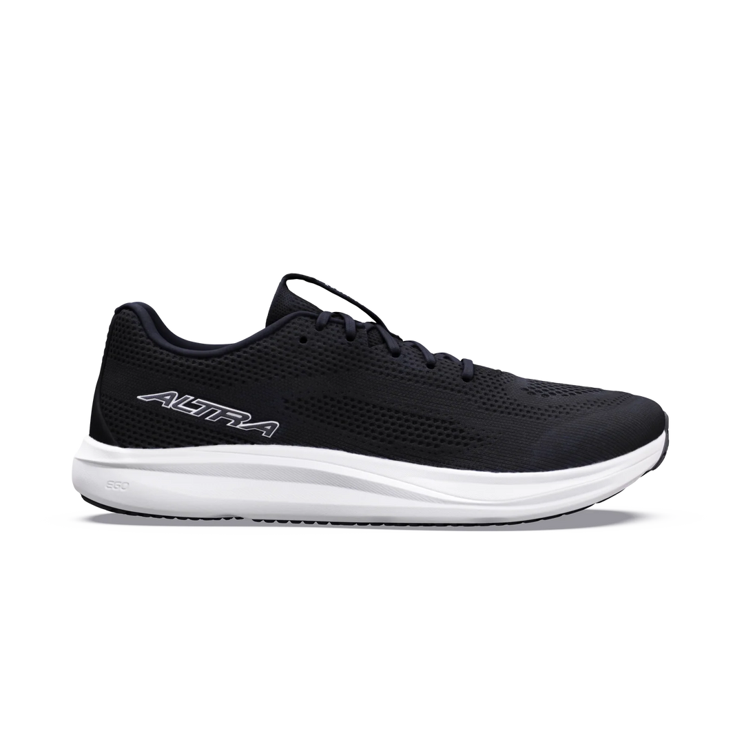 A black ALTRA Escalante 5 men’s running shoe with a white sole is shown in profile against a plain light background. It features breathable mesh material, the ALTRA logo on the side, and is designed with a FootShape Fit and zero drop for natural comfort and performance.