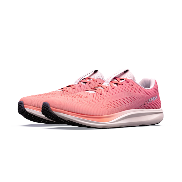 A pair of ALTRA Escalante 5 (Women’s) pink athletic running shoes with white soles and black outsoles, displayed on a white background. These shoes feature a sleek design with visible mesh material, the ALTRA brand name on the side, FootShape Fit, and an Altra EGO midsole for enhanced comfort and performance.