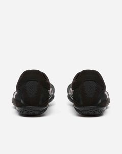 Rear view of Vibram KSO Evo (Men's) black athletic shoes with mesh fabric and textured soles, ideal for balance workouts or functional fitness, displayed on a plain white background.