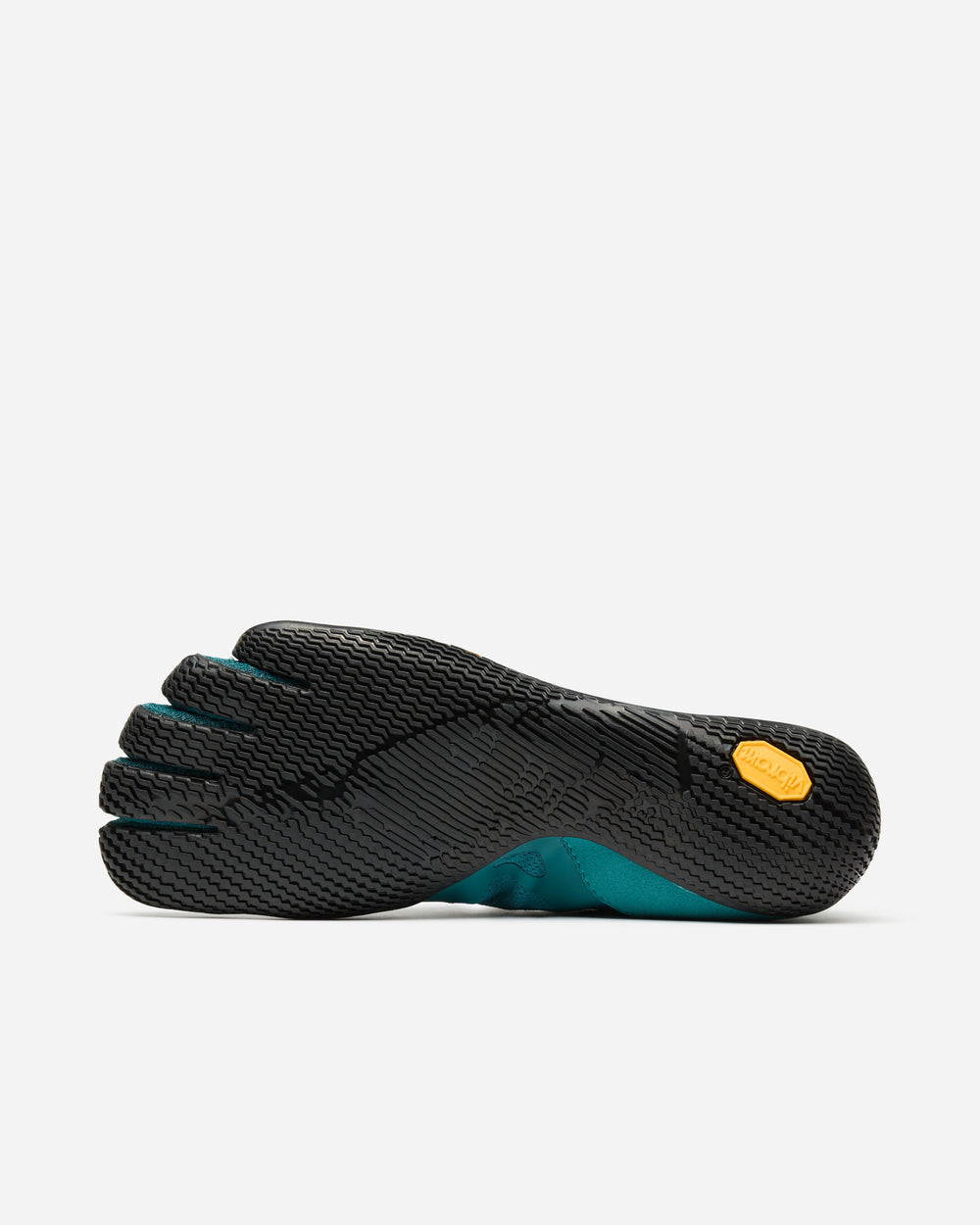 A close-up of the Vibram KSO Evo (Women's) sole shows black and turquoise minimalist design with individual toe slots, textured rubber grip, and a yellow Vibram logo on the arch—ideal for functional fitness.