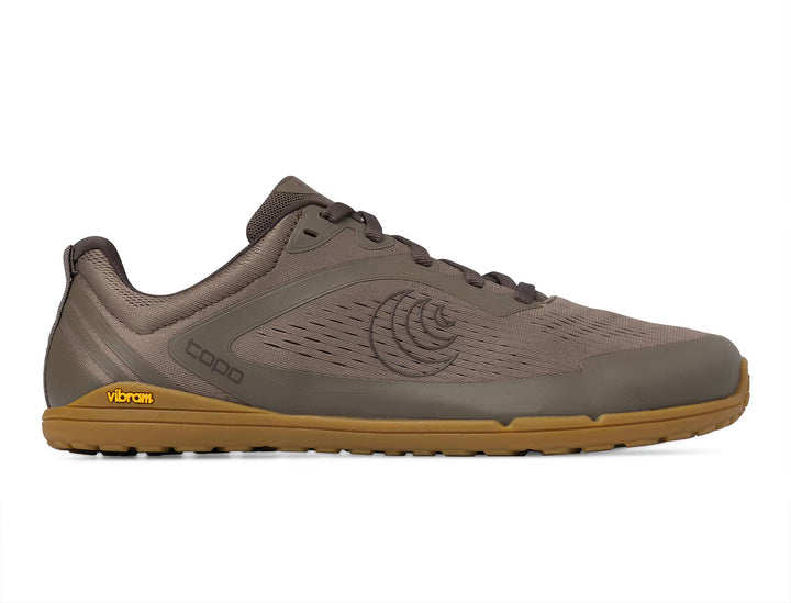 The TOPO Connect (Men’s) is a brown minimalist athletic shoe with a lace-up design, showcasing a mesh upper and a textured tan Vibram outsole, expertly crafted and displayed in side profile against a white background.