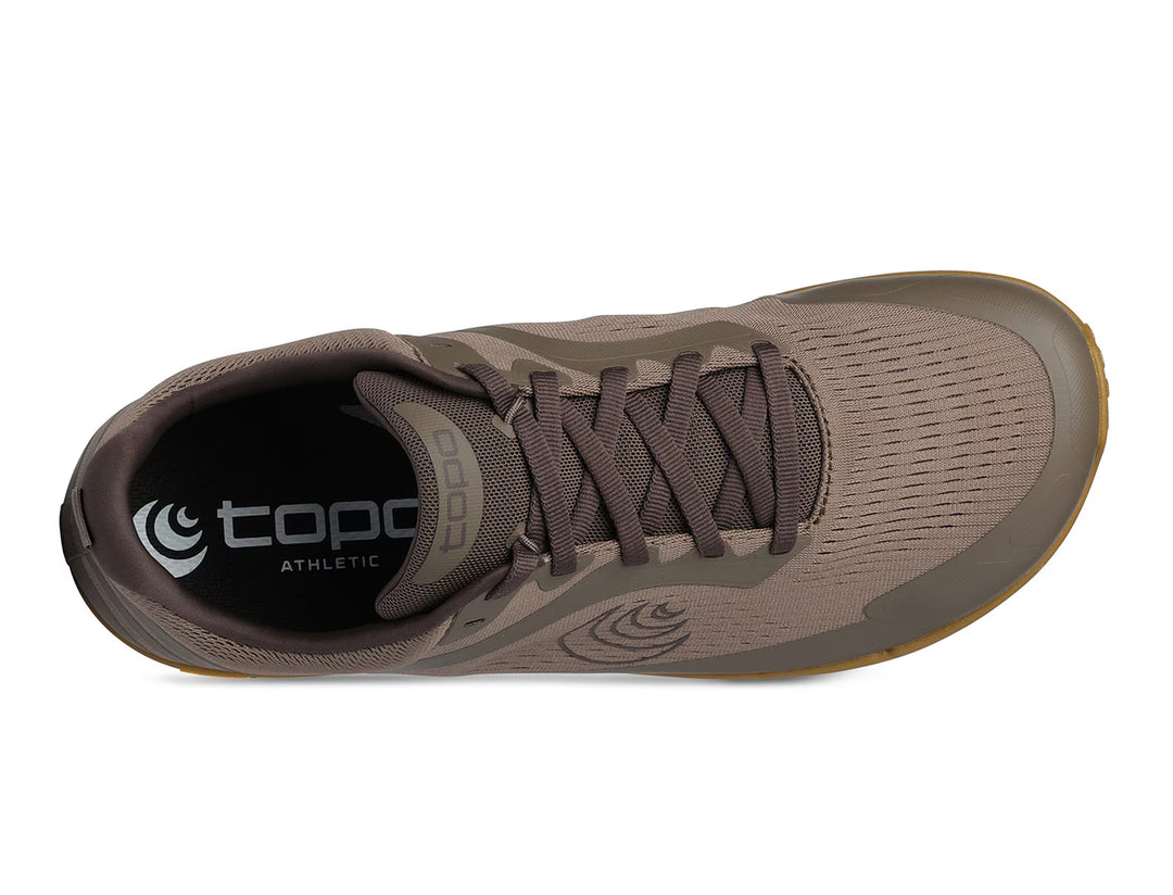 Top view of the brown TOPO Connect (Men’s) running shoe, showcasing its mesh upper, laces, and branded insole. This minimalist design features a rounded toe, ventilation holes for breathability, and a performance-oriented Vibram outsole that offers enhanced traction.