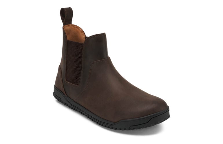 The Ridgeway Chelsea (Men's) boot features brown leather, black elastic side panels, a pull tab at the back, and a textured black rubber sole, shown against a white background.
