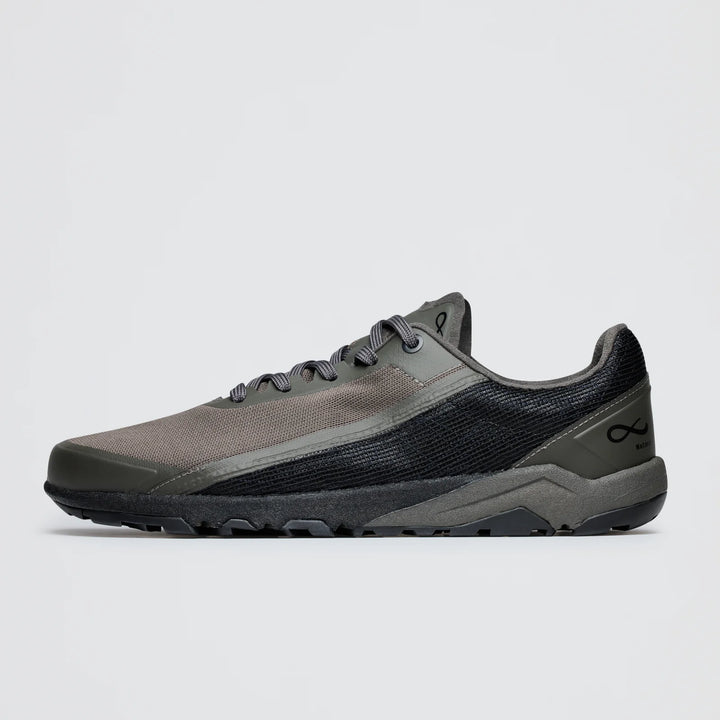 The Notace Yama T1 (Men's) is a low-top trail shoe in grey and black with a mesh upper, textured side panel, black laces, minimalist infinity logo near the heel, and a light grey sole designed for all-day comfort.