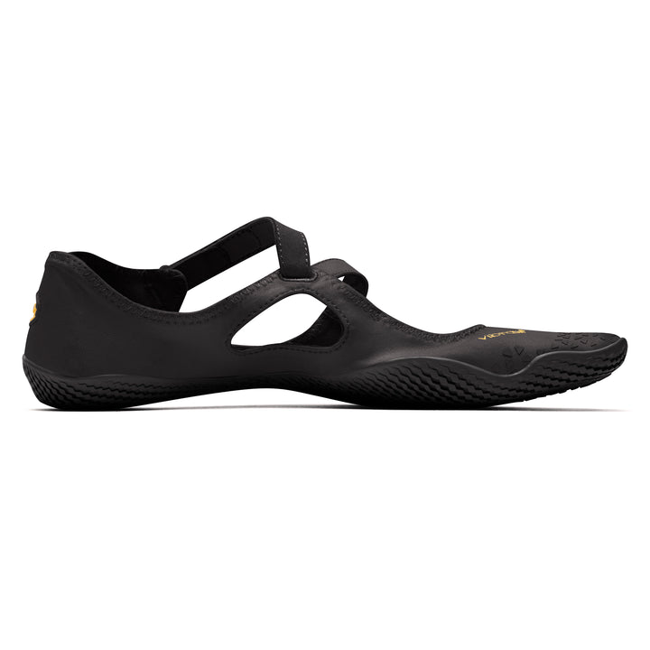 Side view of the Vibram V-Soul (Women’s) in black, a minimalist athletic shoe featuring a strap across the top, open side sections, and a textured sole. Designed for a close fit that mimics barefoot footwear, these shoes are ideal for Pilates, promoting enhanced natural movement.