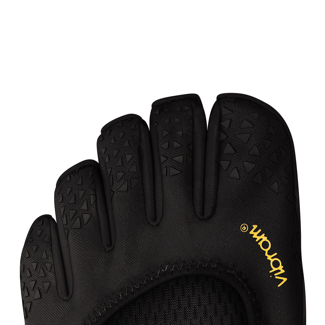 Close-up of the black Vibram V-Soul (Women’s) shoe, highlighting its individual toe pockets and textured rubber patterns—an excellent choice for women seeking functional fitness footwear that offers enhanced grip and flexibility.