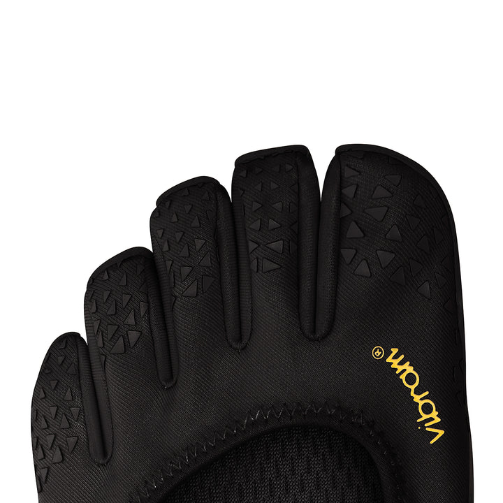 Close-up of the black Vibram V-Soul (Women’s) shoe, highlighting its individual toe pockets and textured rubber patterns—an excellent choice for women seeking functional fitness footwear that offers enhanced grip and flexibility.