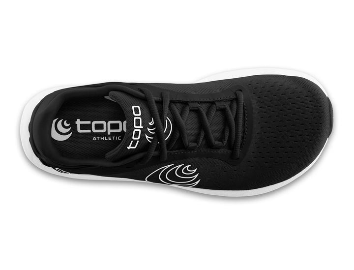 Top view of the TOPO ST-6 (Women's) black athletic shoe with white accents, TOPO branding on the heel and tongue, a spacious toe box, wave pattern on the side, and a white sole.