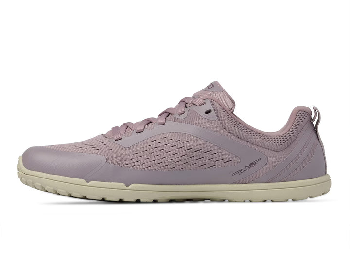 TOPO Connect (Women’s) minimalist shoe in light purple with a beige sole, mesh panels, and lace-up closure, featuring a Vibram outsole for enhanced durability—shown in side profile on a white background.
