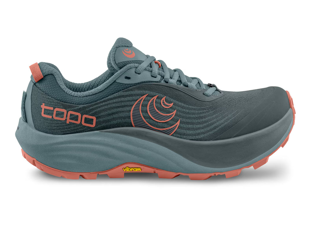 Blue-grey TOPO Pursuit 3 (Women’s) zero drop trail runner with orange accents and a thick, cushioned platform featuring a lugged orange outsole.