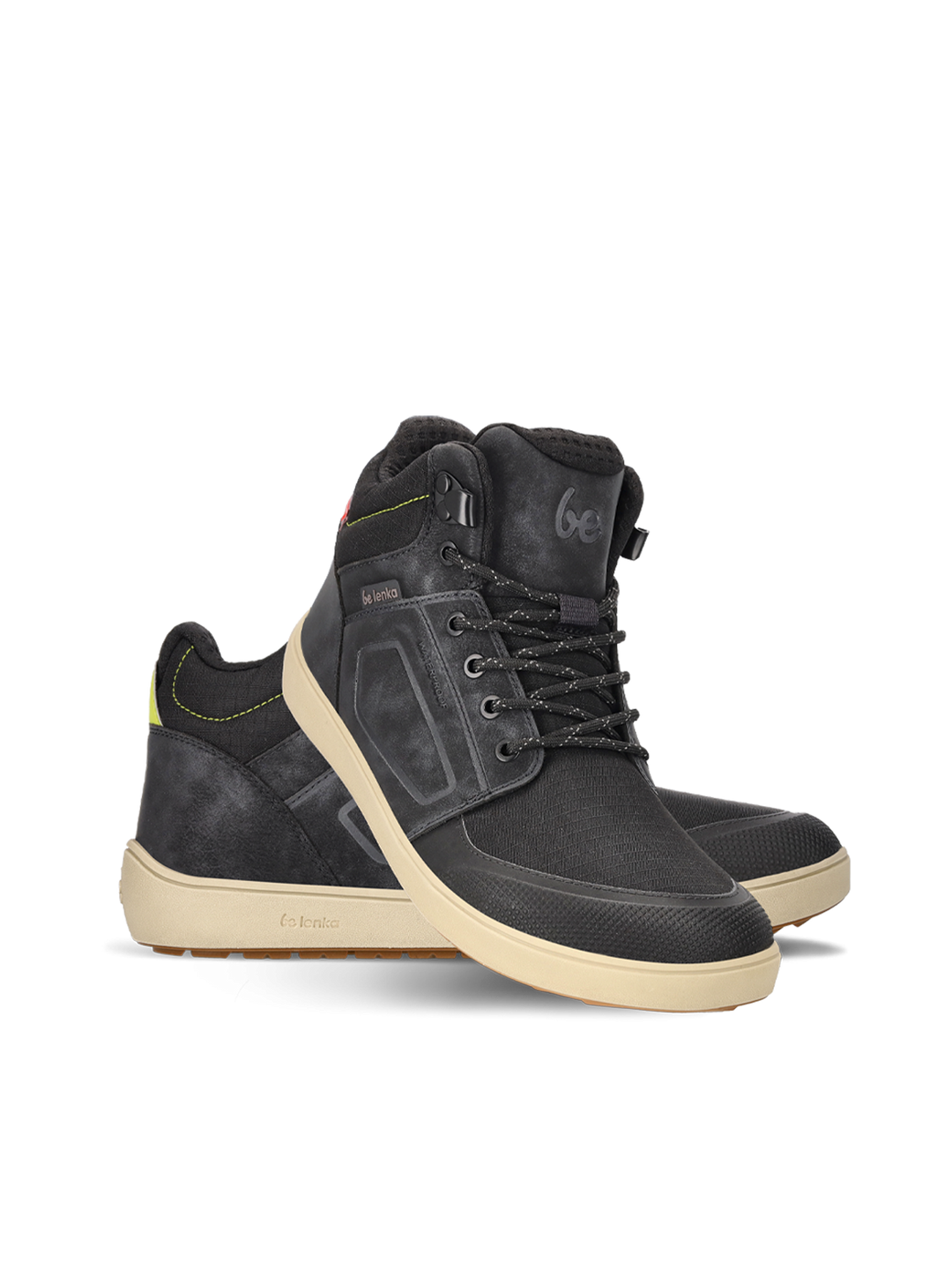The BeLenka ArcticEdge (Unisex) features black high-top sneakers with beige ThermoGrip Neo soles, black laces, and subtle yellow heel accents, shown against a plain white background.