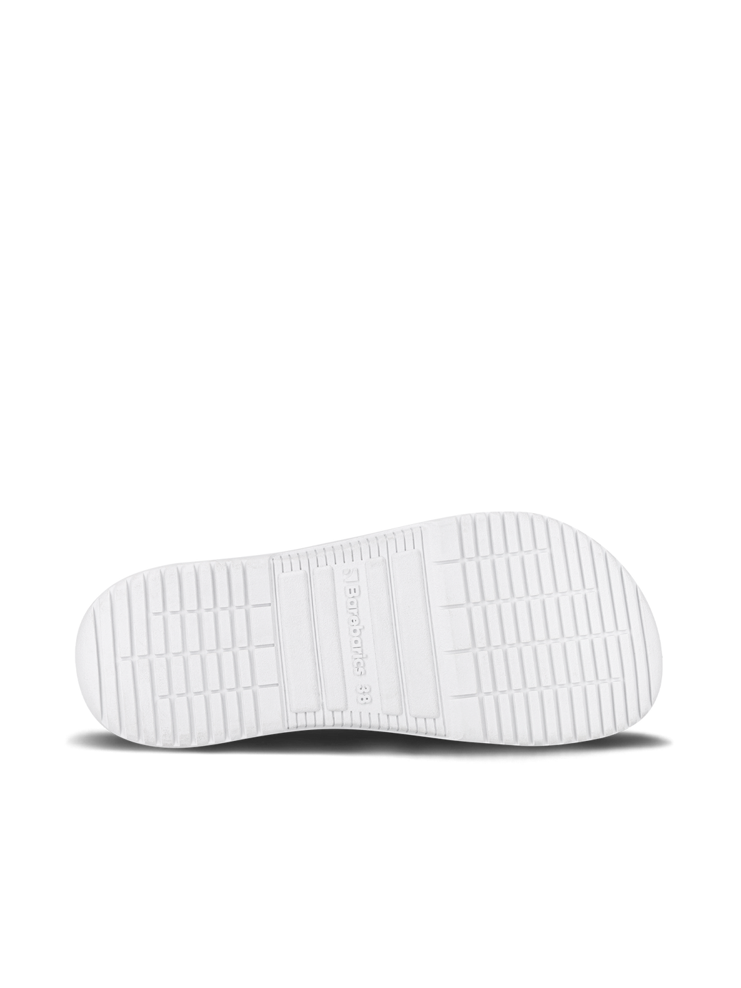 The image shows the bottom view of a white unisex Barebarics Zing sneaker sole with various rectangular tread patterns and "Barebarics" embossed in the center. The background is plain white.
