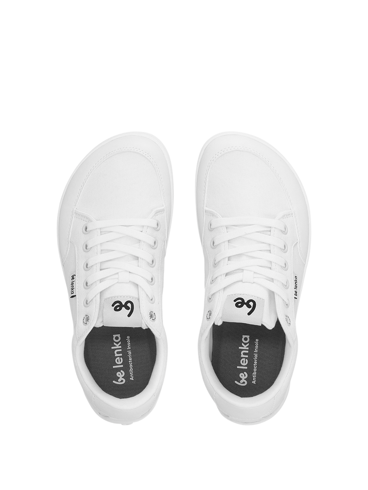A pair of white BeLenka Rebound (Unisex) sneakers viewed from above, featuring white laces and black insoles with the BeLenka logo and "barefoot" text.