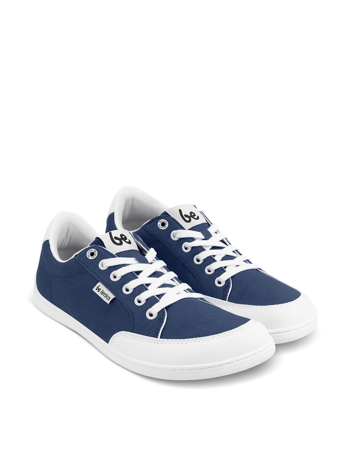 BeLenka Rebound (Unisex): These navy blue and white retro sneakers feature white laces and soles. Lightweight and stylish, they offer everyday comfort—perfect for any casual outfit. Displayed on a white background.