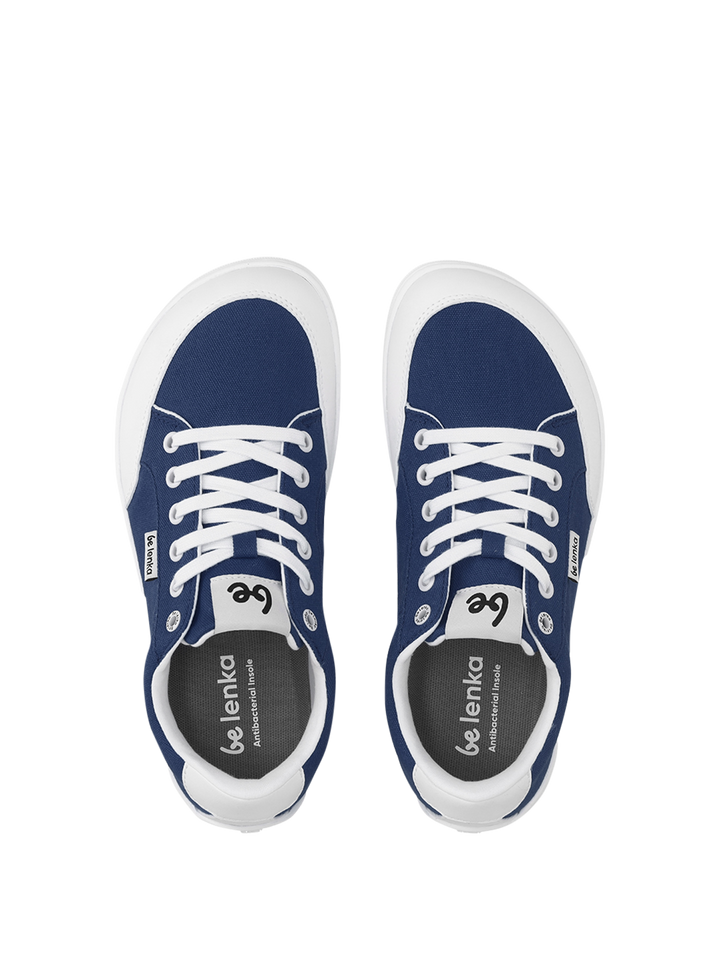 A pair of BeLenka Rebound (Unisex) blue and white lightweight sneakers with white laces, viewed from above; the BeLenka logo appears on the tongue and insole of each comfortable shoe.