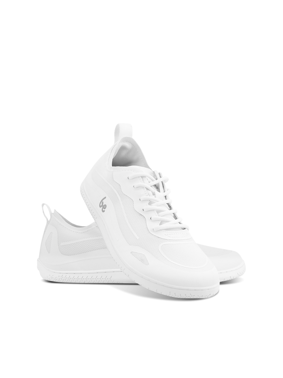 A pair of BeLenka Velocity (Unisex) sneakers in sleek white, designed with breathable mesh panels and matching white laces. These athletic shoes feature a flexible sole for durability, comfort, and support—perfect for workouts or daily wear. One shoe stands upright while the other rests on its side, both showcased against a plain white background.