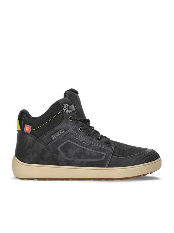 Side view of BeLenka ArcticEdge (Unisex) sneaker in black, featuring a beige ThermoGrip Neo sole, black laces, red tag by the heel, padded collar, and subtle geometric accents on the side.