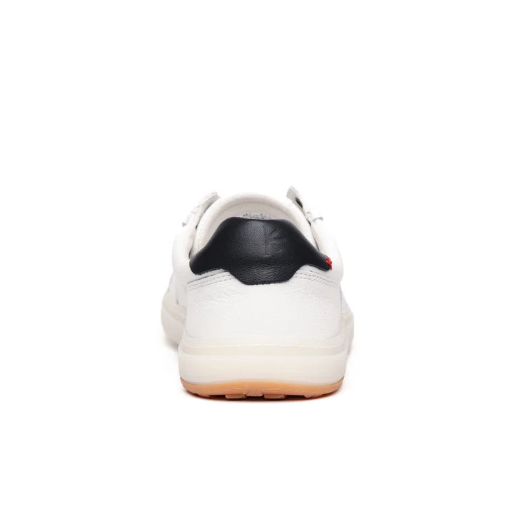A rear view of the BluSun BLSN-600+ (Men’s) barefoot sneaker highlights its black heel tab and light brown rubber sole engineered for natural comfort. The white sneaker features a wide toe box for generous space, presented against a plain white background.