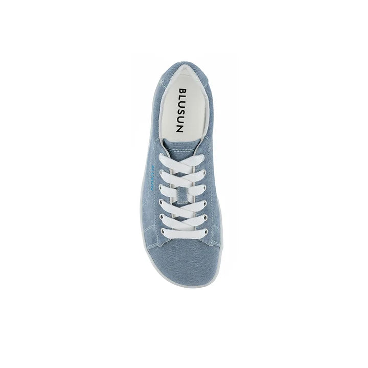 Light blue BLSN-103 (Men’s) casual sneaker by BluSun, featuring white laces and a classic low-top silhouette with a white rubber sole. Viewed from above, the insole is branded with BluSun. Designed as a sustainable sneaker, the shoe is set against a plain white background.