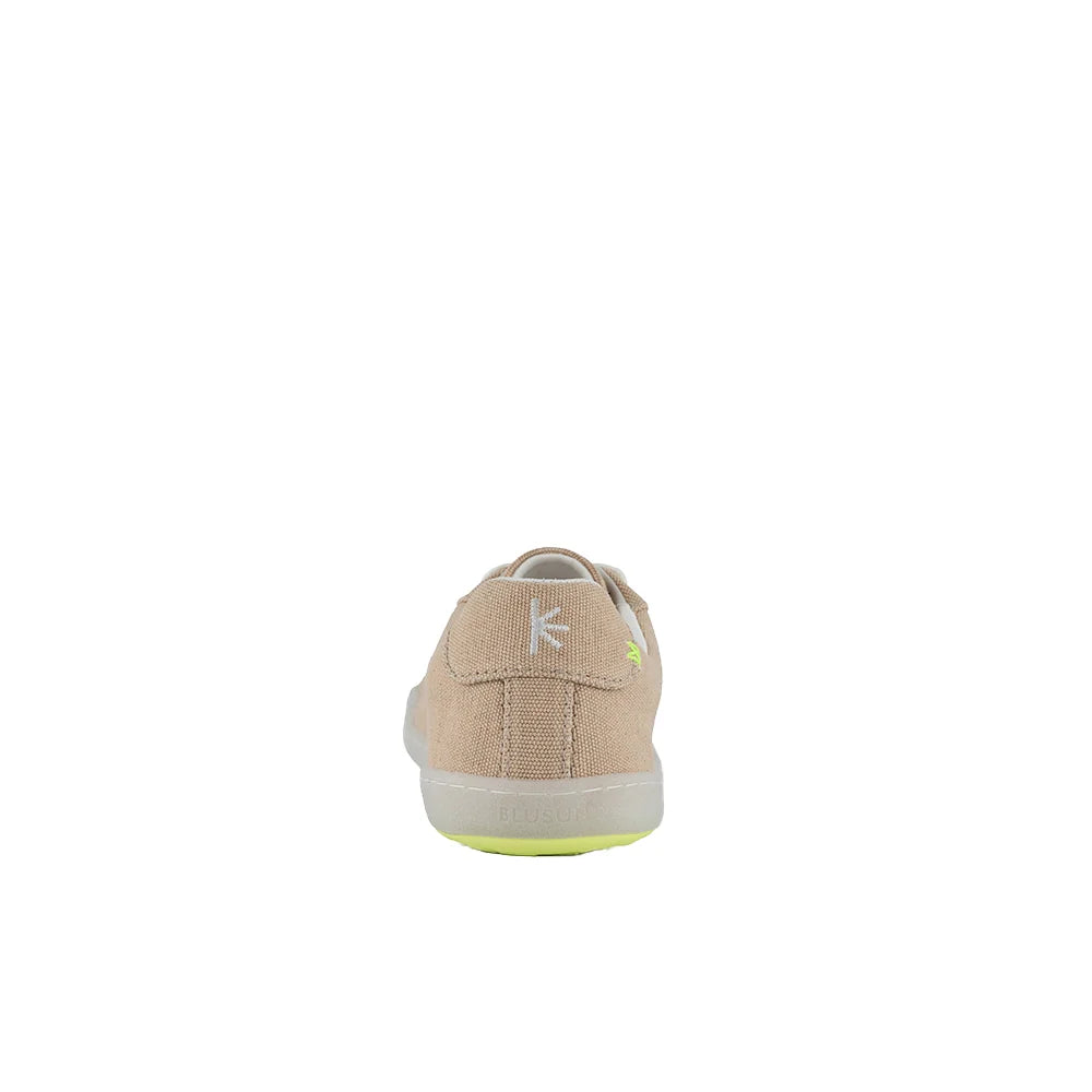 The BluSun BLSN-103 (Men’s) barefoot shoe in beige is shown from the back, featuring a white BluSun logo on the heel, a white sole, and a neon yellow accent on the bottom. The background is plain white.