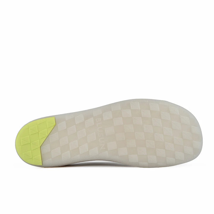 The image shows the bottom sole of the BLSN-103 (Men’s) barefoot shoe by BluSun, featuring a checkered pattern. The heel area is yellow, while the rest of the sole is translucent white. The BluSun text is faintly visible in the center.