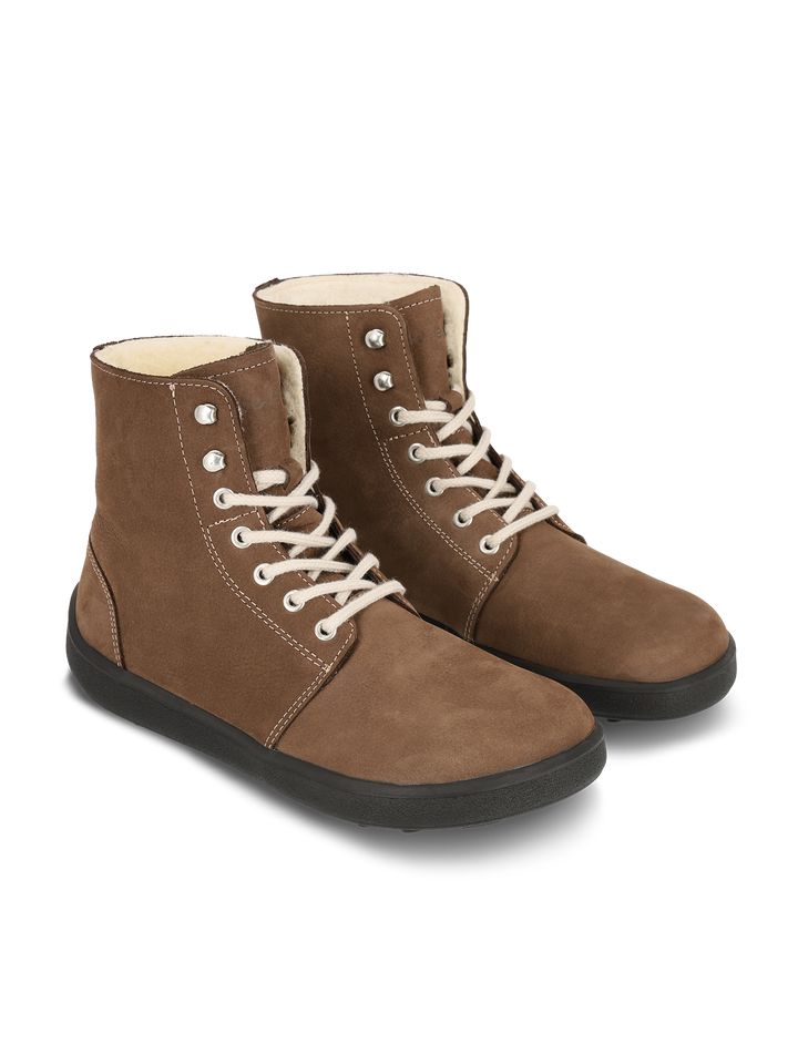 The BeLenka Winter 3.0 (Unisex) boots feature brown suede, beige laces, white stitching, metal eyelets, black rubber soles, and a warm Merino wool lining, shown on a white background.