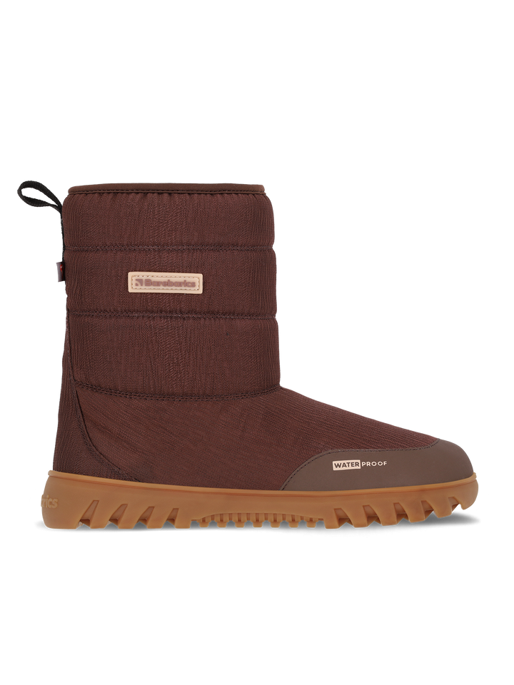 A side view of the Barebarics Polarstride (Women's) brown winter boot with Primaloft lining, rubber sole with textured grip, waterproof membrane, back pull tab, and small branded label on the side.